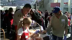 Thousands along Skid Row receive Thanksgiving meals, services