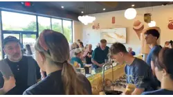 Crowds gather for Oggi Gelato's new Trumbull shop grand opening