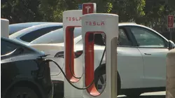 Tesla under investigation after parents say faulty door handles trapped their kids in the back