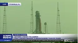 Spectators gather to watch Artemis II launch