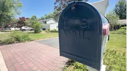 Trio accused of 'fishing' thousands of checks worth $4.8M out of various Suffolk County postal boxes