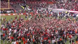 Fans storm the field after Wolfpack's upset win over Georgia Tech