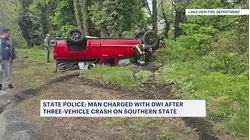 Pickup truck overturns on Southern State Parkway following 3-vehicle crash; driver arrested for DWI