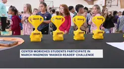 Center Moriches teachers act as 'Masked Readers' for elementary school reading competition