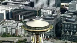 Daredevils scale and jump from Space Needle in Seattle