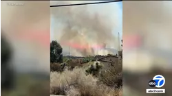 Brush fire threatens structures in San Bernardino County