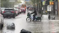 Flash floods in NYC kills 2, closes roads and subways