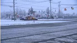 THUNDERBOLT 12: Steady snowfall accumulates in Woodbury