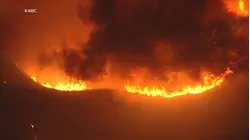 Wildfires burn across Southern California
