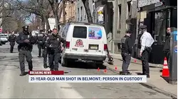 Man injured during broad daylight shooting in Belmont; person of interest in custody