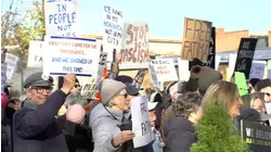 Dozens hold rally calling for the release of detained Wendell woman