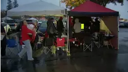 Fresno State football fans face the rain to cheer on the Bulldogs