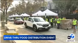 Food bank's drive-thru distribution event in Exposition Park attracts thousands
