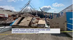 Powerful storms cause partial building collapse, snap utility poles and close roads in Milford and Orange