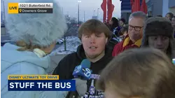 On top of the Big Bus Express for Disney Toy Drive