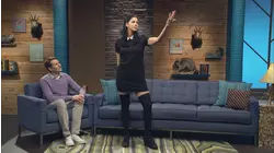 David Cross Wears a Red Polo Shirt and Brown Shoes with Red Laces