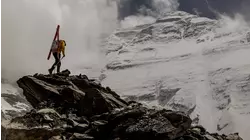 After spreading his late partner's ashes on Mount Everest, skier makes history