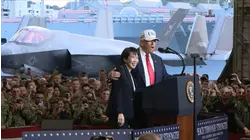 Trump hints at sending military to US cities in address to American troops in Japan