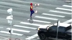 See Fire-Juggling Unicyclist Perform Impromptu Street Show