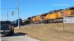 Terrifying video shows moment train smashes into 18-wheeler