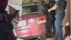 Car crashes into Monroe home injuring 92-year-old resident and driver