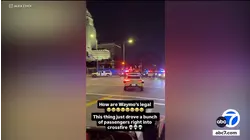 Waymo self-driving taxi takes passenger through active police scene in downtown LA