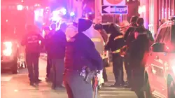 Person of interest in custody after Brown University shooting, official says