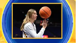 Women's basketball hero gets her ovation