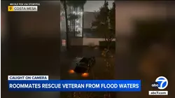 Roommates rescue elderly man caught on flooded Costa Mesa street, video shows