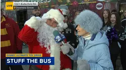 Santa helps Stuff The Bus