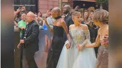 Ariana Grande rushed by man at movie premiere