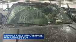 Asphalt shatters windshield of car driving in north suburbs: couple