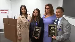 Father and daughter who saved stabbing victim's life honored