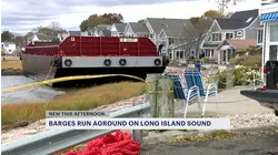 Barges that washed ashore in Milford drifting toward West Haven