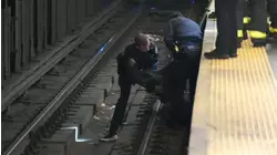 Officers help man who fell onto tracks at East Harlem subway station after fight