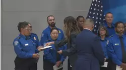 DHS Secretary Kristi Noem hands out $10k bonus checks to some Houston TSA agents
