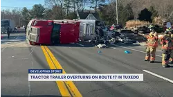 Tractor-trailer overturns, spills trash in Orange County