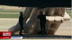 Emergency slide deployed on new Air Force One prior to Trump departure