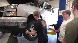 High Schoolers Help Fix Cars and Donate Them to Single Moms