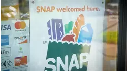 Hundreds stand in line for grocery gift cards at cathedral while waiting for November SNAP benefits