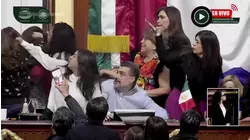 Lawmakers from rival blocs scuffle during Mexico City Congress session