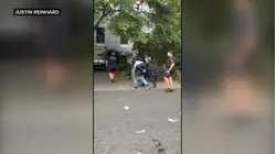 15-year-old detained, 2nd suspect at large following deadly shooting at food festival
