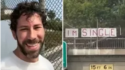 Man hangs up giant 'I'm single' sign on 101 Freeway