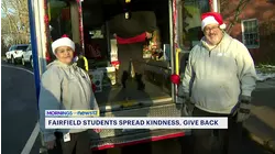 Fairfield students load AMR ambulance with toys for the needy