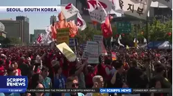 US May Day protesters rally against immigration crackdowns, inequality