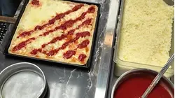 Hampton Bays school administrators trade offices for aprons in Pizza Wars fundraiser