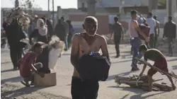 1 killed, 48 wounded when crowd was fired upon at chaotic Gaza aid site, health officials say