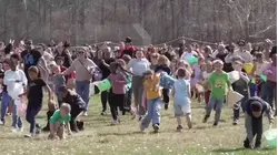 Kids Race to Gather Marshmallows Dropped From Helicopter