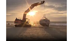 Abandoned sailboat removed after months on the Sea Girt beach