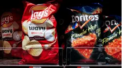 Prices for popular snacks are coming down in time for the Super Bowl
